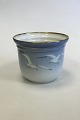 Bing & Grondahl 
Seagul with 
Gold Flowerpot 
No 669. 
Measures 15 cm 
/ 5 29/32 in.