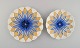 Two antique 
Meissen plates 
in hand-painted 
porcelain. Blue 
flowers and 
gold 
decoration. 
Early ...