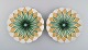 Two antique 
Meissen plates 
in hand-painted 
porcelain. 
Light green 
flowers and 
gold 
decoration. ...