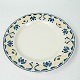 Dinner plate 
decorated with 
yellow and blue 
colours from 
the 1960s.  We 
have 11 in 
stock. 
23 cm.