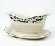 Sauce boat 
decorated with 
blue and yellow 
colours from 
the 1960s. We 
have 2 in 
stock. 
11 x 22 ...