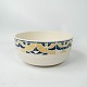 Bowl decorated 
with blue and 
yellow colours 
from the 1960s.
9.5 x 21 cm.