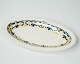 Oval dish 
decorated with 
blue and yellow 
colours from 
the 1960s. We 
have two in 
stock.
22.5 cm.