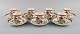 Coalport, 
England. Seven 
Flower of Tibet 
chocolate cups 
with saucers 
decorated with 
flowers and ...