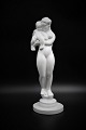 Kähler, white 
glazed ceramic 
figure of woman 
with child.
H:31,5cm. Is 
intact and in 
good condition.