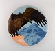 Karl Hansen Reistrup (1863-1929) for Kähler. Colossal unique dish in glazed 
ceramics. Vulture and mountain landscape. Museum quality. Approx. 1900.
