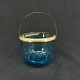 Height 7.5 cm.
Beautiful sea 
blue sugar bowl 
with metal 
handle from 
Fyens Glasværk.
The ...