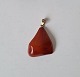 Pendant in 
amber with 8 kt 
gold
Stamp: PHI-PHI
Dimension: 2.7 
x 4.3 cm.