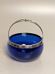 Blue glass 
sugar bowl with 
self-mounting 
Stamped Sv.T. 
Svend Toxværd 
830s Height 
without handle 
...