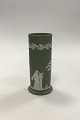 Wedgewood 
cylindrical 
Vase decorated 
with 
harp-playing 
goddesses. 
Measures 16.5 
cm / 6 1/2 in.