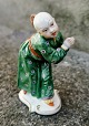 Porcelain 
figurine of a 
young monk 
painted in 
overglaze. 
Manufactured 
for Nymphenburg 
in Germany ...