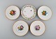 Five antique 
Royal 
Copenhagen 
porcelain 
plates with 
hand-painted 
flowers, 
insects and a 
gold ...