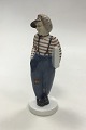 Bing & Grondahl 
figurine of Boy 
with Papers No 
2148. Measures 
20 cm / 7 7/8 
in.