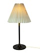 Table lamp with 
frame of black 
metal and brass 
with paper 
shade, of 
Danish design 
by Le Klint ...