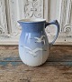 B&G Seagull 
with gold edge 
milk jug 
No. 85
Height 15 cm.
Factory first 
- dkk 500.- 
Stock: ...