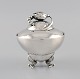 Georg Jensen 
Blossom sugar 
bowl in 
hammered 
sterling 
silver. Model 
2D. Dated ...