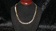 Geneva necklace 
with 14 carat 
gold
Stamped 585 J 
& co
Length 42 cm
Width 
5.87-8.30 ...