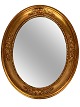 Ovale mirror 
with frame of 
leaf gold, from 
the 1920s. The 
mirror is in 
great antique 
condition. ...