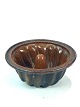 Ceramic pudding 
shaper in brown 
colours from 
around the 
1930s. The bowl 
is in great 
antique ...