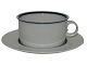 Royal 
Copenhagen 
Indigo, tea cup 
with matching 
saucer.
Designed by 
artist Anne 
Marie Trolle 
...