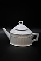 Royal 
Copenhagen 
White Fan oval 
Teapot. 
Designed by 
Arnold Krog in 
1909. 
Decoration 
number: ...