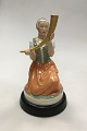 Royal 
Copenhagen 
Figurine Girl 
with the Horn 
of Gold No 
12242. Measures 
22 cm / 8 21/32 
in. ...