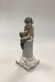 Royal 
Copenhagen 
Figurine Faun 
with Rabbit No 
456. Measures 
23 cm (9 1/16 
in) and is in 
good ...