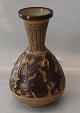 Michael 
Andersen & Son, 
Bornholm 6404 
Vase with 
people in 
relief 23 cm In 
nice and mitn 
condition