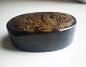 Lidded box with 
decoration of 
dragon. Made in 
turtle shield. 
Presumably made 
in China around 
...
