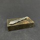 Length 6.5 cm.
Stamped H.J. 
for Hans Jensen 
and 830S for 
silver.
It is shaped 
like a tie ...