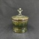 Height 14.5 cm.
Unusual lid 
jar from the 
1930s in metal 
and with a 
putti.
The surface of 
the ...