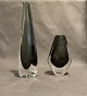 2 vases
Orrefors 
nr.3538 1150 
KR. and nr.3595 
450 KR.
H: 29,5 cm, 17 
cm
Good condition
Niels ...