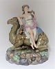 Royal 
Copenhagen. 
Porcelain 
figure. Woman 
on dromedary. 
From the series 
"The four 
continents" ...