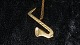 Georg Jensen 
Year # 1996 
Ornament
Motif: 
Saxophone
Gold plated
Nice and well 
maintained 
condition