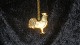 Georg Jensen 
Year # 1999 
Ornament
Motive: 
Rooster
Gold plated
Nice and well 
maintained 
condition