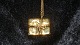 Georg Jensen 
Year # 2000 
Ornament
Motif: Gift
Gold plated
Nice and well 
maintained 
condition