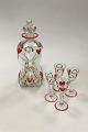 Holmegaard Kluk 
Kluk Decanter 
with 4 schnapss 
glasses 
decorated with 
red hearths. 
Measures ...