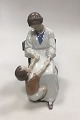 Bing & Grøndahl 
Figurine of 
Mother with Son 
No 1642. 
Measures 22 cm 
/ 8 21/32 in.