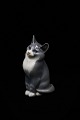 Royal 
Copenhagen 
porcelain 
figure of 
little cat.
Decoration 
number: 1803. 
2.sort. 
H:13,5cm.
Is ...