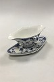 Royal 
Copenhagen Blue 
Fluted Half 
Lace Sauce Boat 
No 585. 
Measures 24 cm 
/ 9.45 in. With 
a chip ...