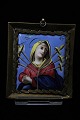 Antique Madonna 
motif painted 
on faience in 
brass frame. 
Can be used as 
a pendant, hung 
on the ...