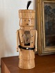 Vintage 
nutcracker made 
of stick glued 
wood. The 
nutcracker is 
shaped like a 
soldier with a 
...