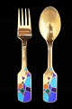 A. Michelsen; A 
christmas fork 
1990. Fork of 
gold plated 
sterling silver 
with enamel. L. 
16,2 ...