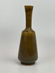 Ceramic / 
stoneware vase 
from Anderson & 
Johansson, 
Hoganas, 
Sweden. Glossy, 
brown glaze 
with ...