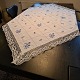 Embroidered tablecloth with Blue Flower pattern Dimensions 137 x 137 cm.