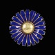 Georg Jensen. 
Gilded Silver 
Daisy Brooch / 
Pendant with 
Royal blue 
Enamel. 50mm
Crafted by ...