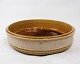 The ceramic 
bowl in dark 
brown shades, 
created by 
Herman Kähler 
in the 1960s, 
is a beautiful 
...