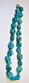 Turquoise necklace with polished pieces, 20th century Length: 46 cm.