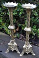 A pair of French candlesticks in cast bronze and brass, 19th century Gothic form. Foot with ...