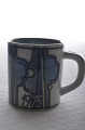 Royal 
Copenhagen 
faience. Annual 
mug from 1975. 
Fine condition. 
Height 7 cm. 2 
3/4 inches.  
...